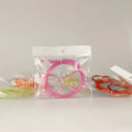 Pink novelty straw glasses set in clear bag with built-in drinking straw