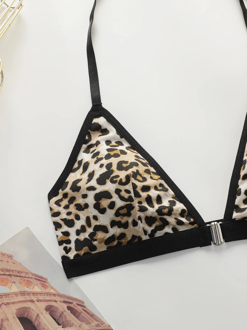 Leopard print triangle bralette with black straps and front metal hook closure