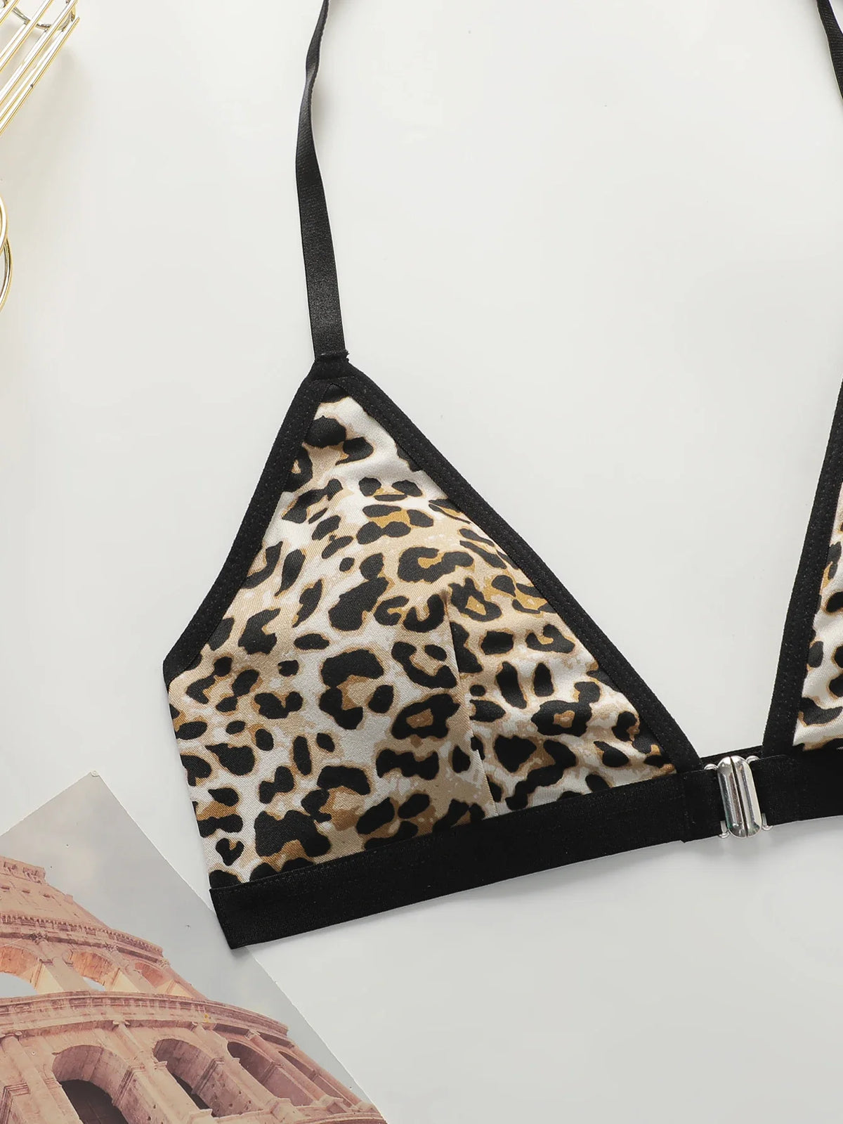 Leopard print triangle bralette with black straps and front metal hook closure