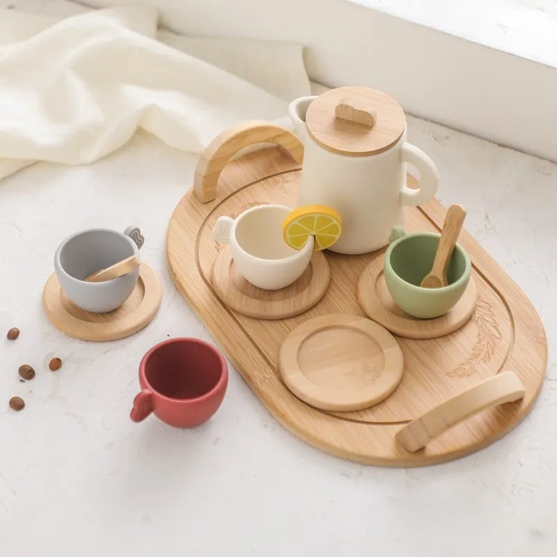 Wooden tea set tray with white, red, gray, and green cups and saucers