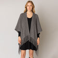 Gray open-knit crochet shawl wrap with draped front and long fringe hem