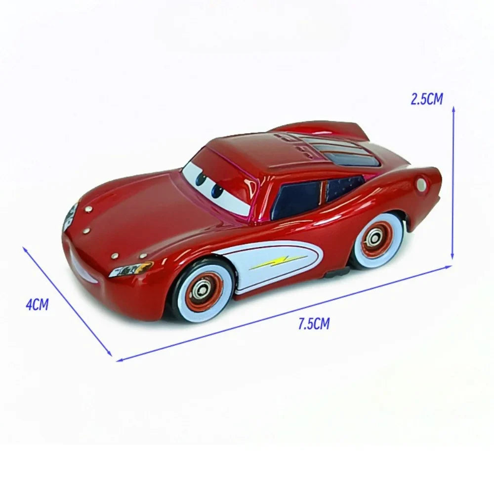 Red diecast racing car toy with white wheel rims and side stripe graphic, front view.
