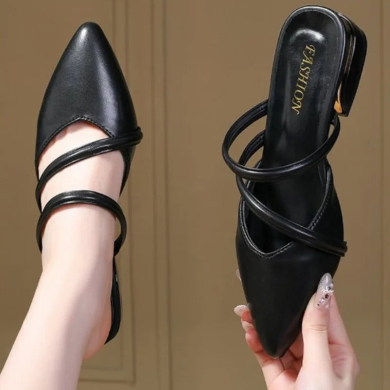 Black pointed-toe slingback slippers with double narrow straps and low block heel
