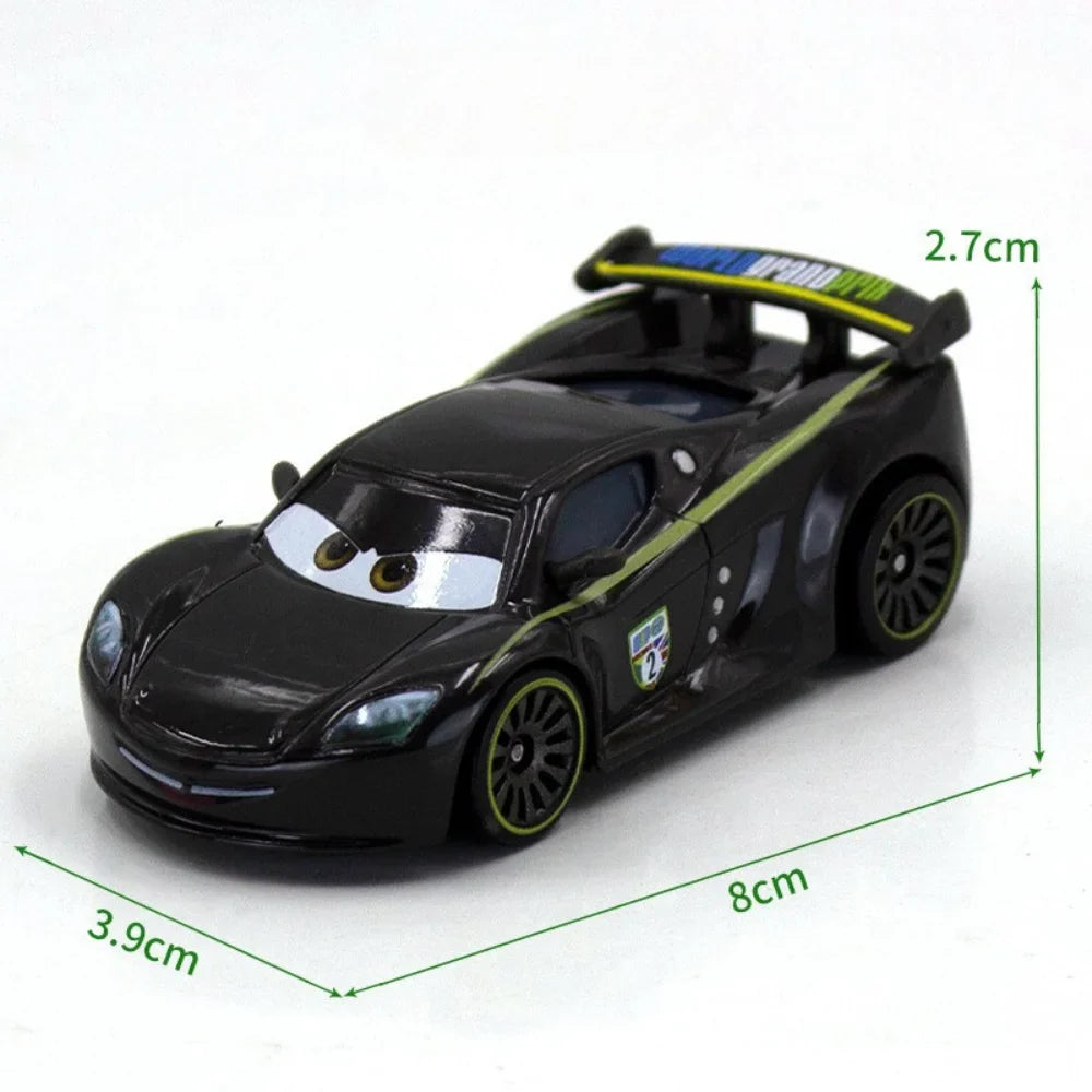 Diecast racing car model toy in black with green graphics and cartoon face