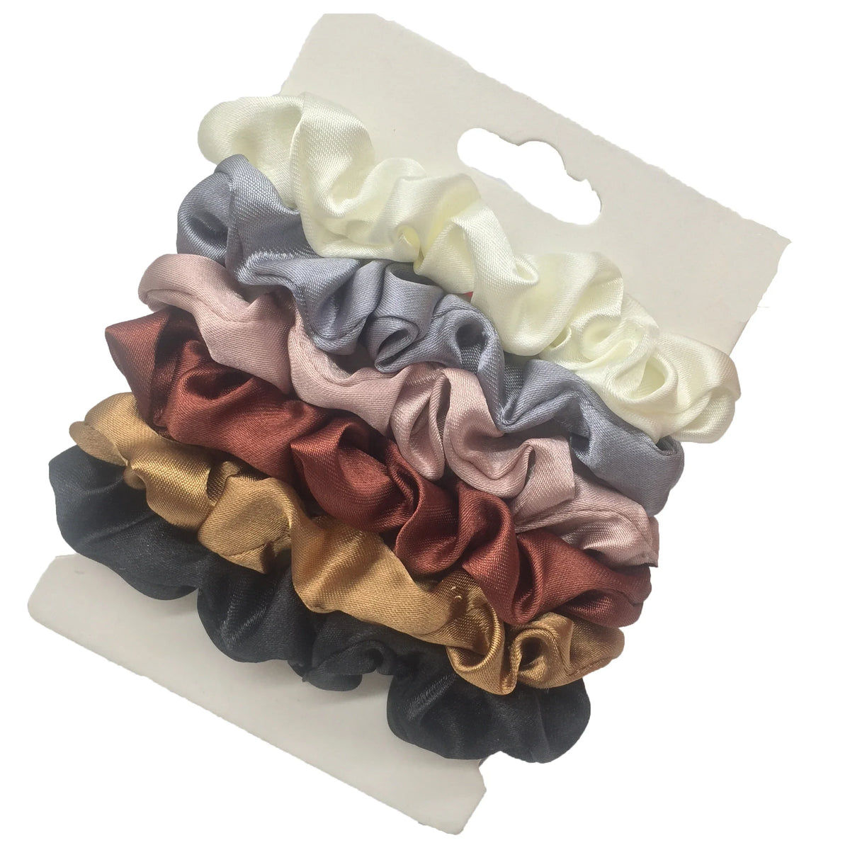 Silk satin scrunchies set in ivory, light grey, blush, and bronze