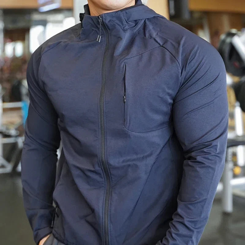Men's nylon workout hoodie in navy, full-zip front, attached hood, chest pocket detail