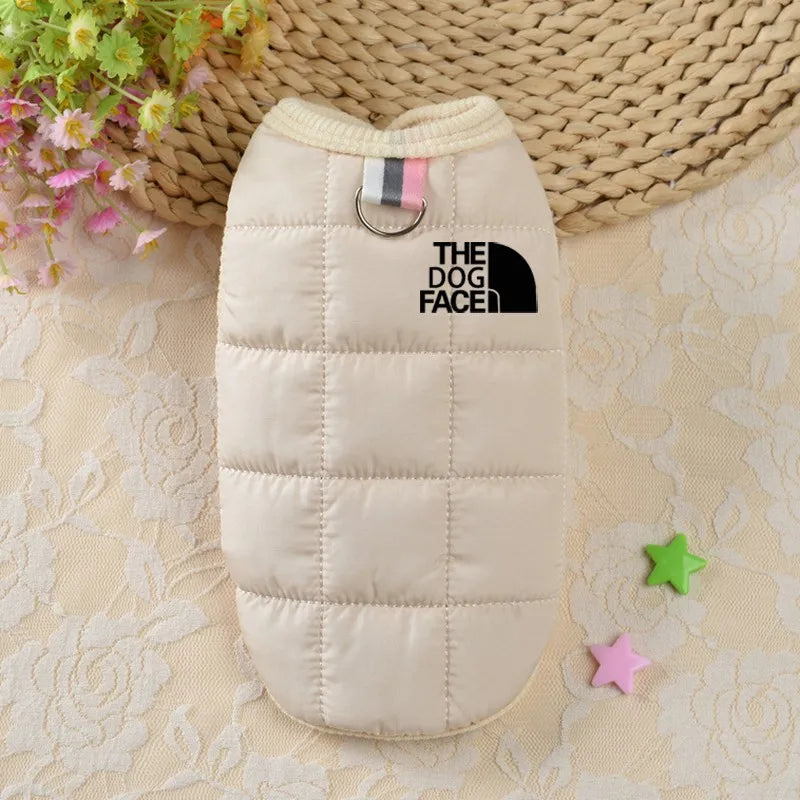Cream puffer dog hoodie coat with hood, front ring, and The Dog Face logo