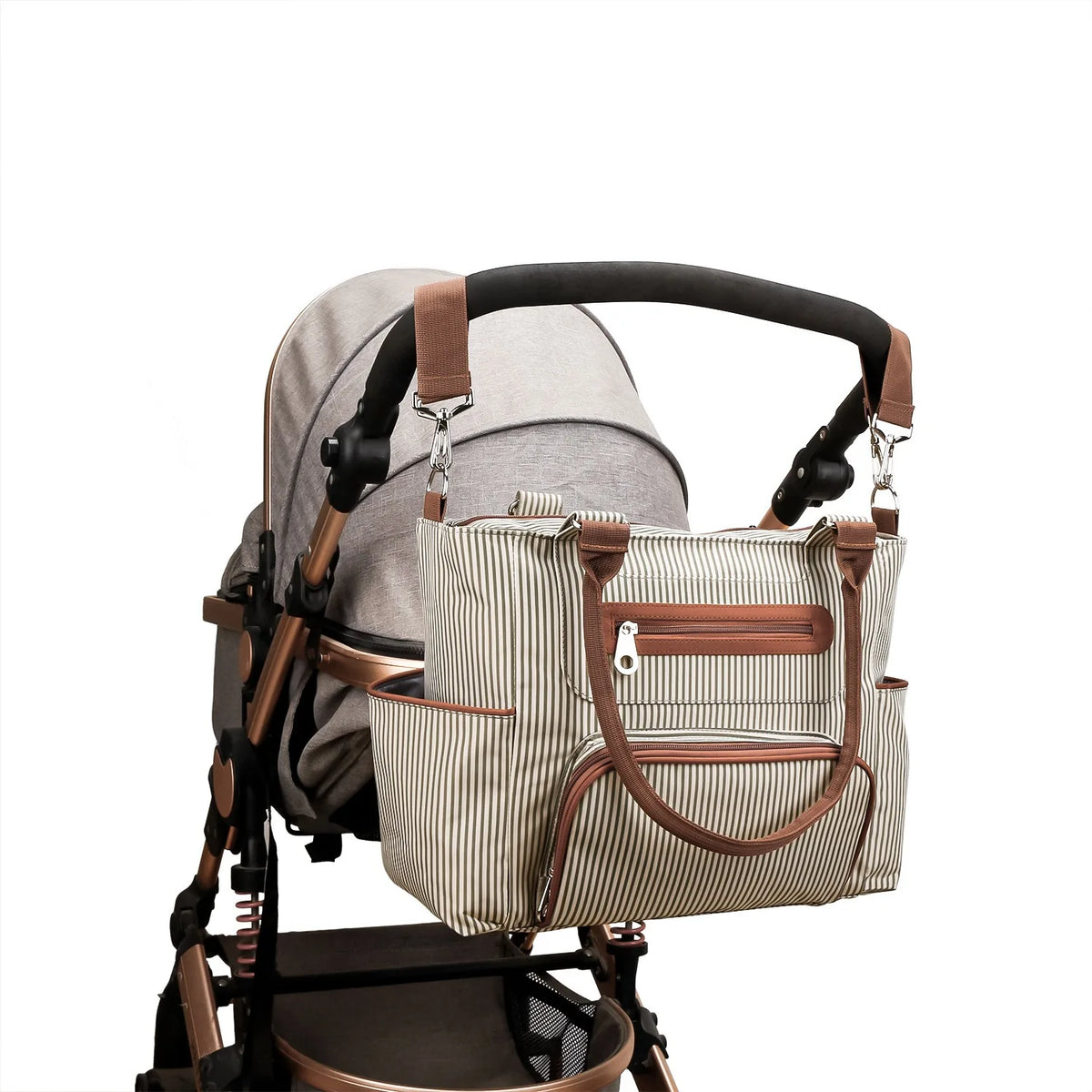 Diaper bag set with stroller clips, beige striped tote, and brown handle accents
