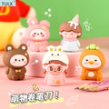 Set of cute animal pencil sharpeners with small figure designs, pink and orange colors.