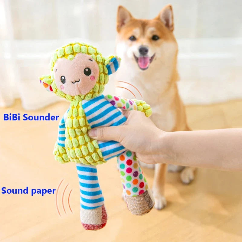 Green and blue bug plush dog toy with smile face, holding striped legs
