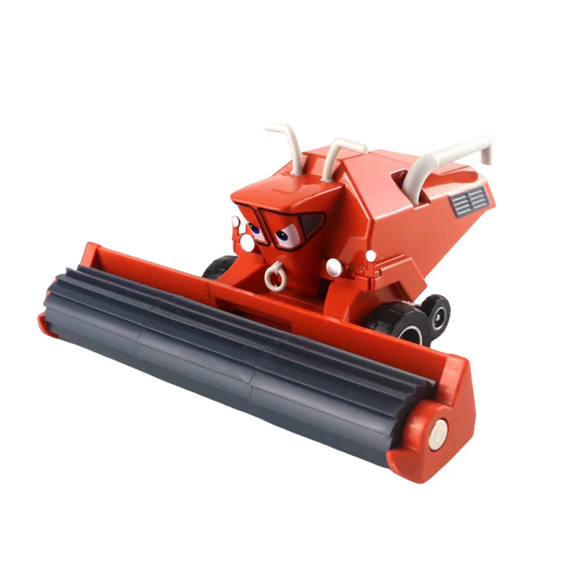 Red diecast race car model with large black bumper and smiling face, side view