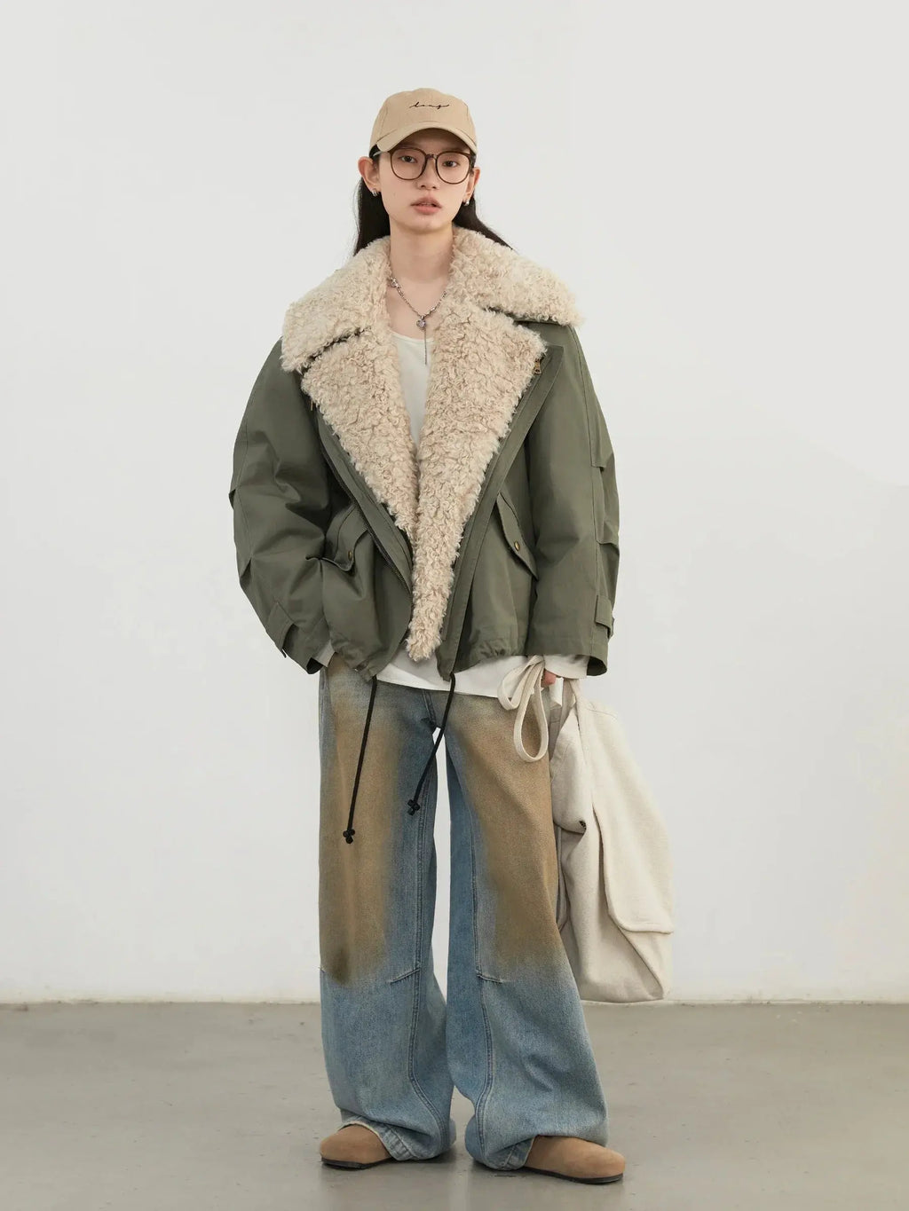 Women’s loose cotton jacket, dark green with cream fleece-lined hood and pockets