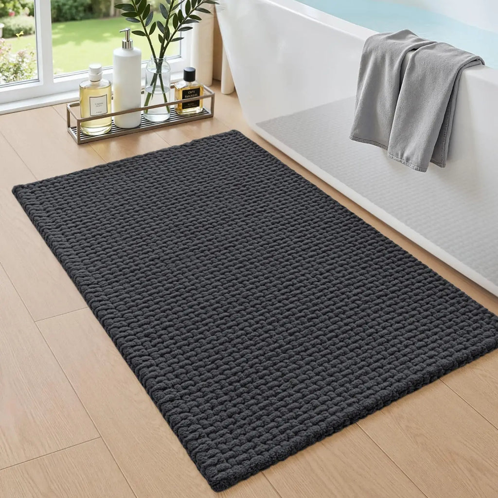 Dark grey chenille bath mat, rectangular textured pile for bathroom floor