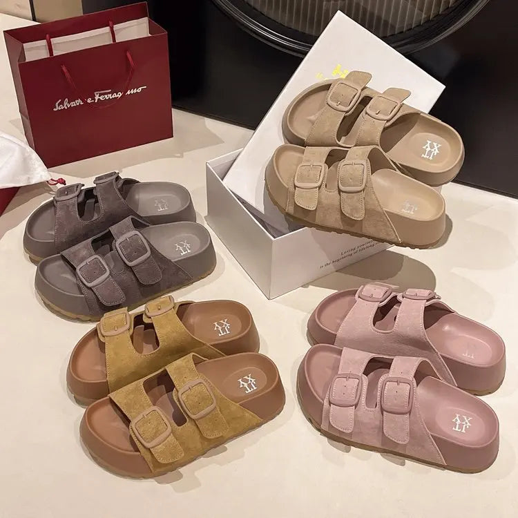Assorted suede platform slide sandals with double buckle straps in multiple colors