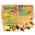Kids wooden toolbox set open, showing pegboard sections and assorted pretend tools