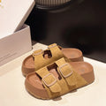 Gold suede platform slide sandals with two adjustable buckle straps