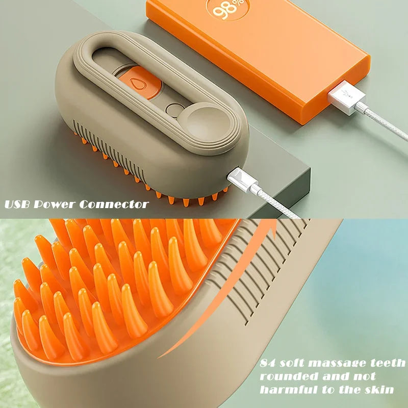 Orange bristle pad and soft massage teeth on a cream electric pet steam brush head
