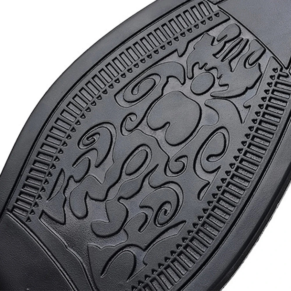 Black rubber outsole with textured traction tread pattern
