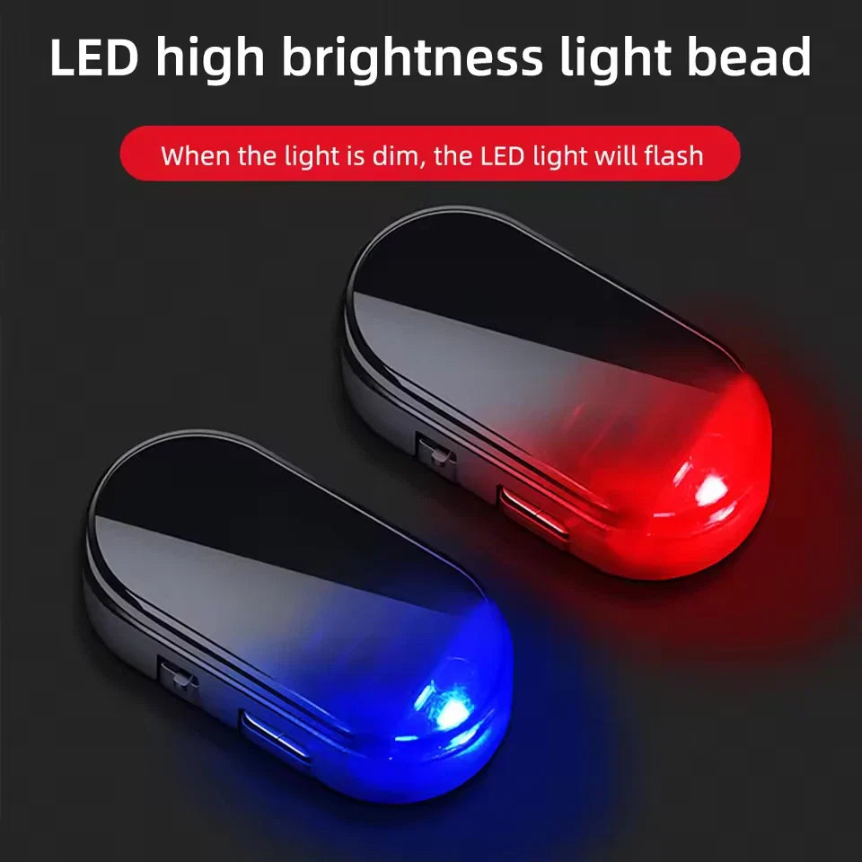 Two-LED dummy alarm lights: red glow and blue glow, black oval housings