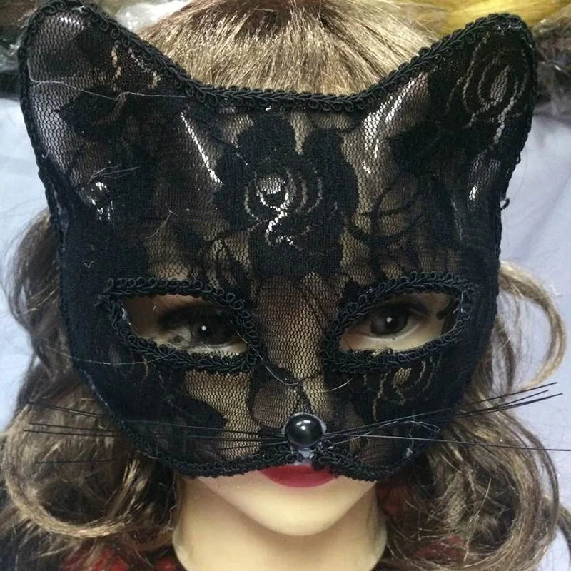 Black lace cat masquerade mask with floral lace, central bead, ribbon ties, eye cutouts