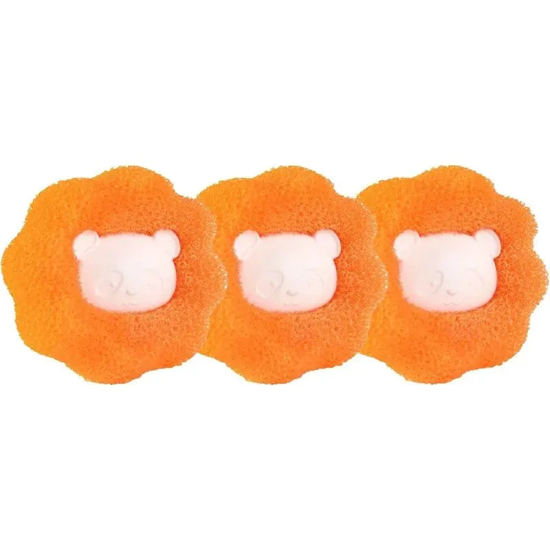 Orange pet hair remover laundry balls with bear-shaped white grips, 3-pack