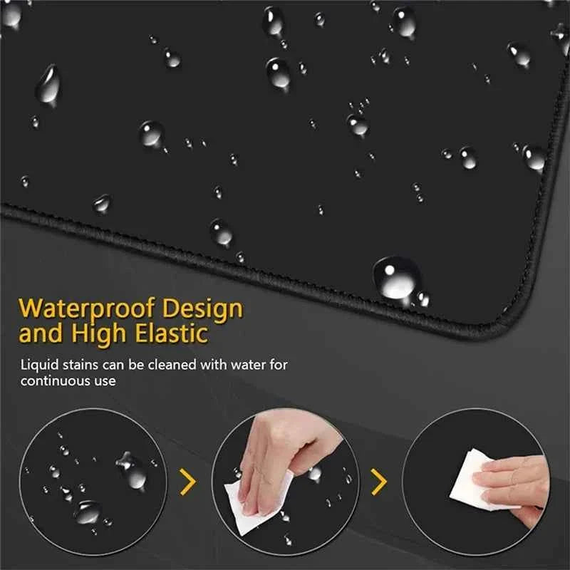Water-resistant XXL gaming mouse pad, dark surface with water droplets and stitched border