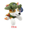 19 cm cartoon dog plush doll with green cap and green vest, side-looking pose