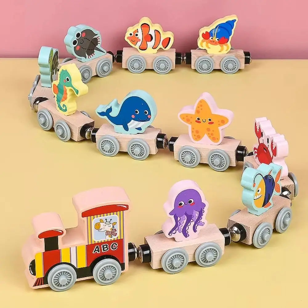 Wooden magnetic train set with ocean animal block cars, including dolphin, seahorse, and starfish