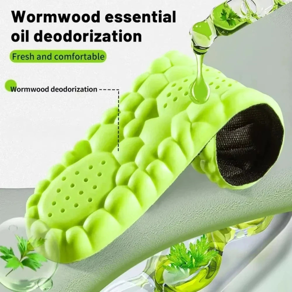 Green sport insole with ventilated toe and black cushioned heel opening