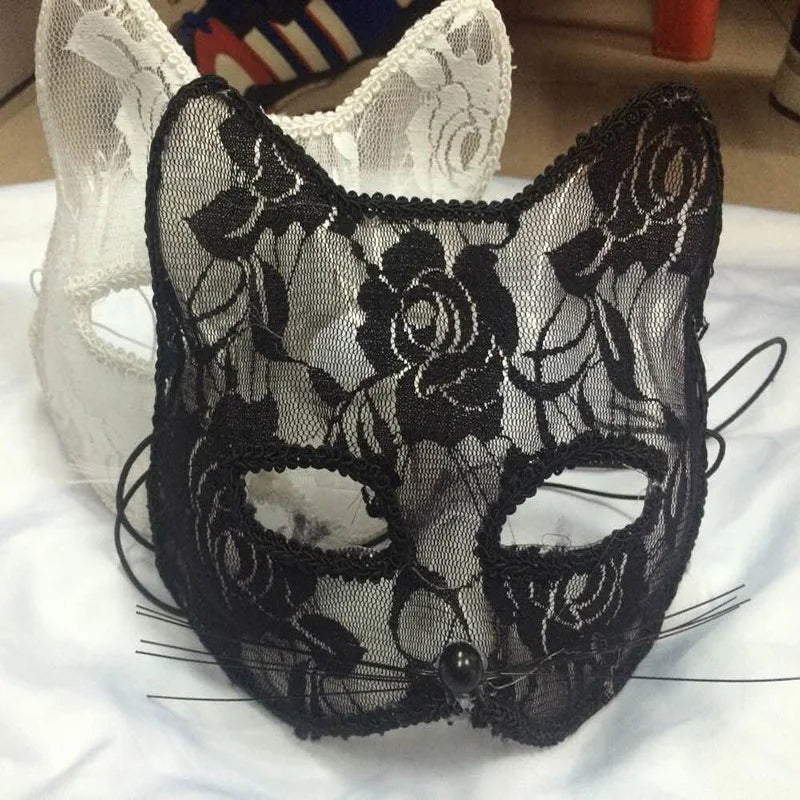 Black lace cat masquerade mask with floral pattern, central bead, ribbon ties, eye cutouts