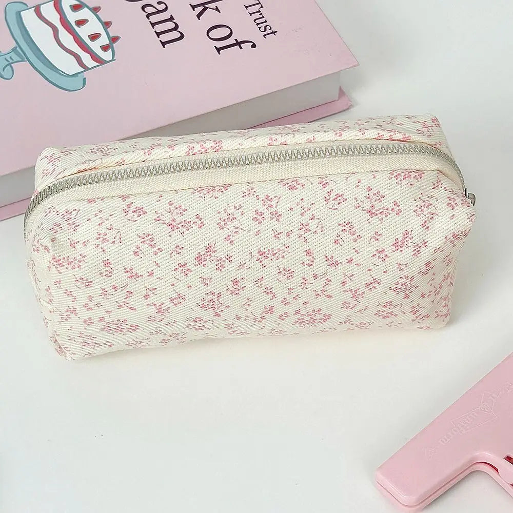 Floral canvas pencil case with red speckle print and silver zipper