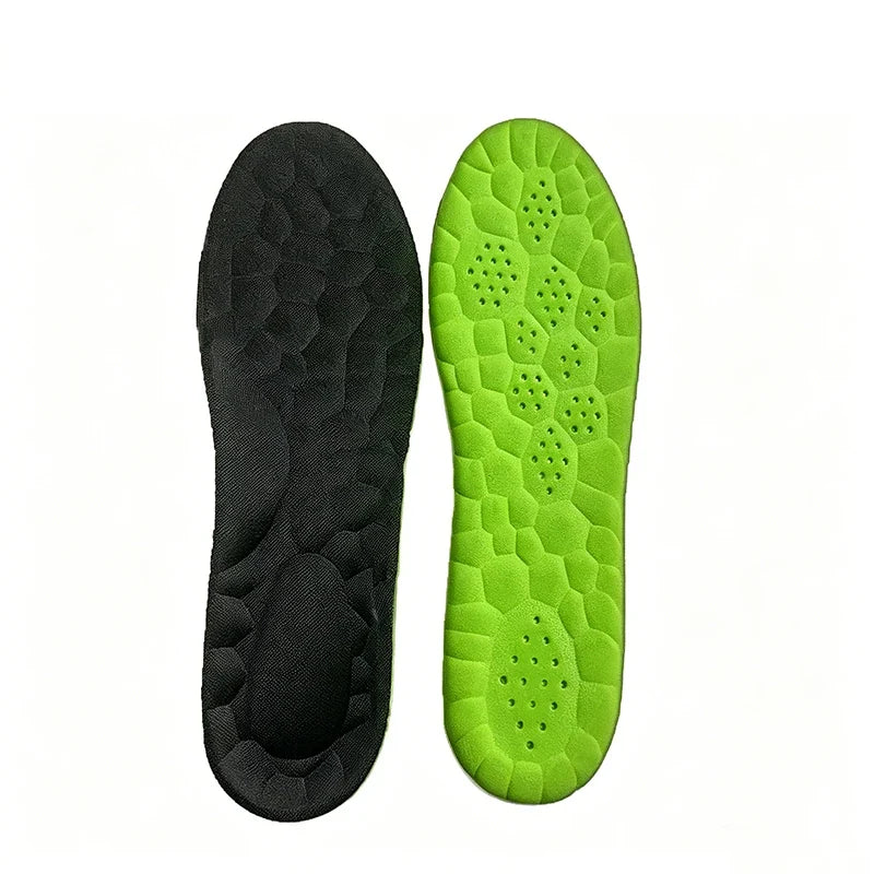 Pair of sports insoles in black and neon green, cushioned honeycomb tread