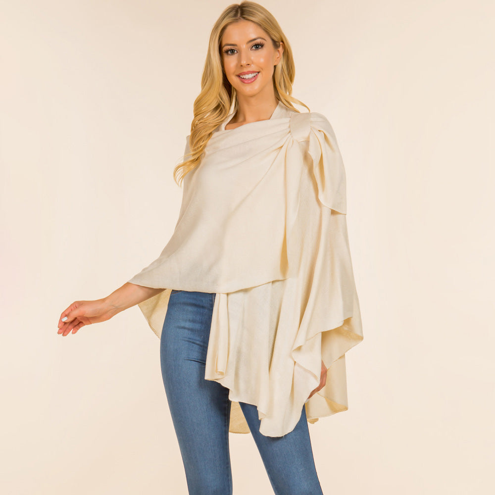 Cream solid drape wrap poncho with draped sleeves and asymmetrical hem