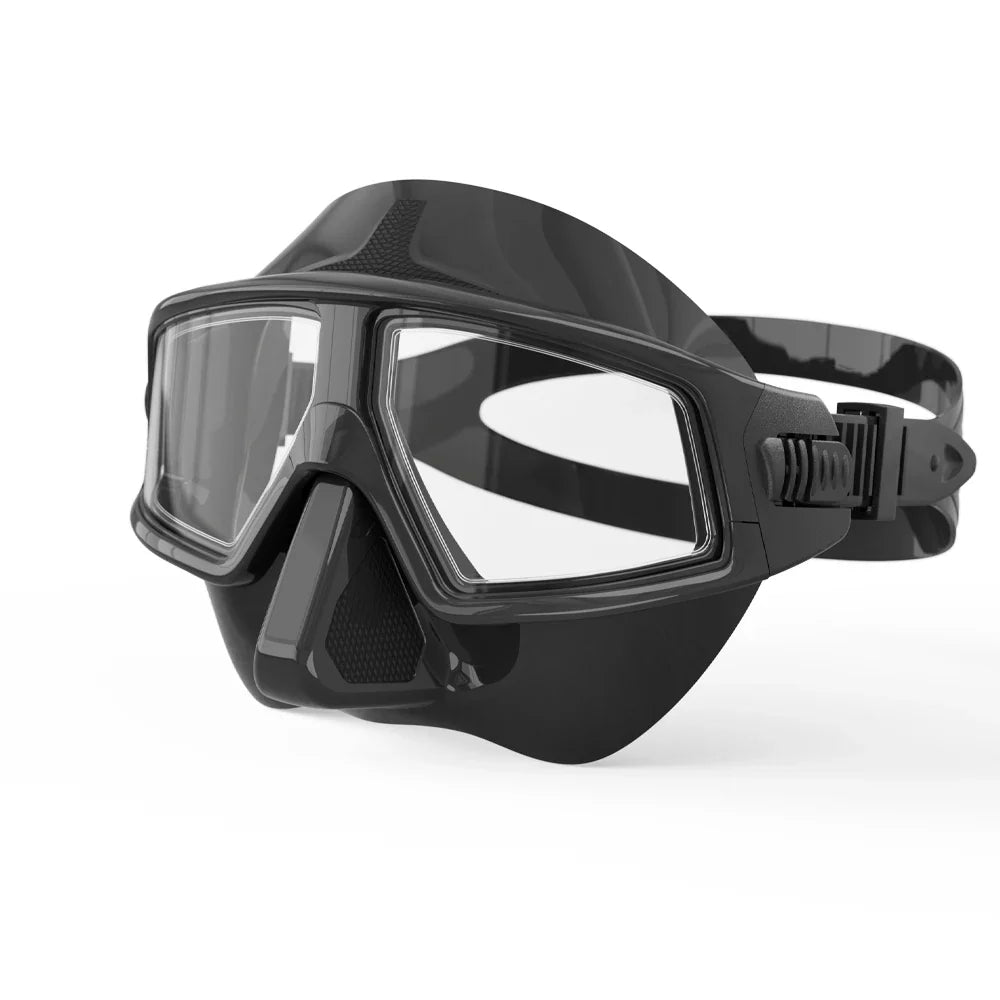 Black scuba diving mask goggles with clear tempered lens, silicone skirt and adjustable head strap.
