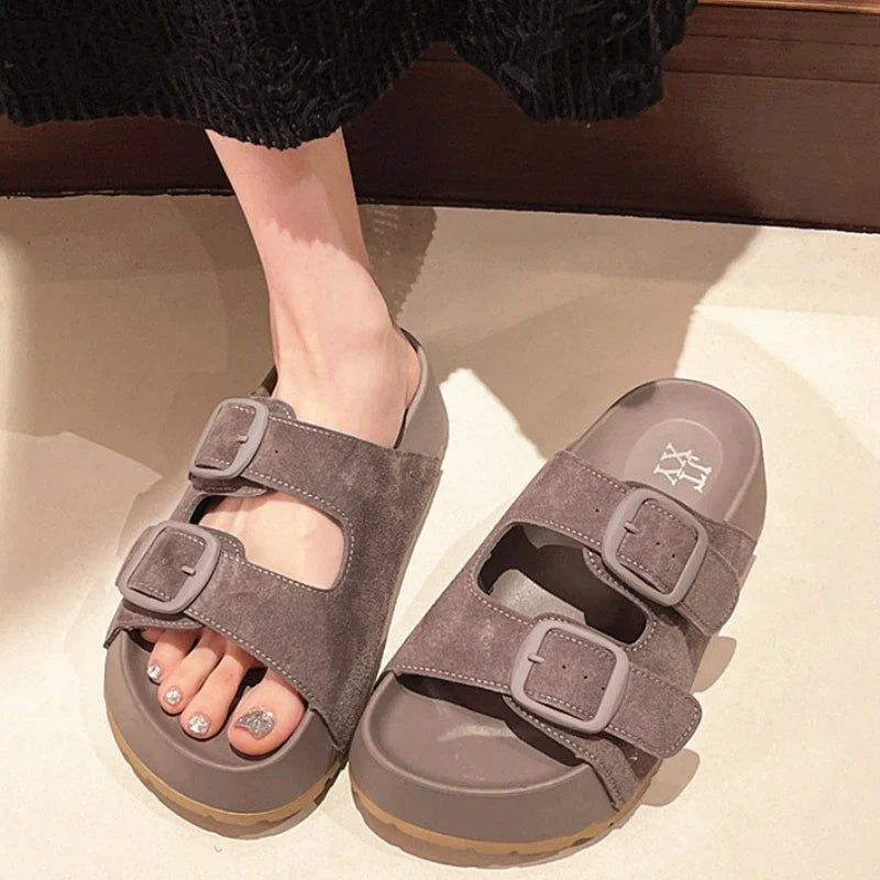 Women’s platform slide sandals with two buckle straps, dark gray color.