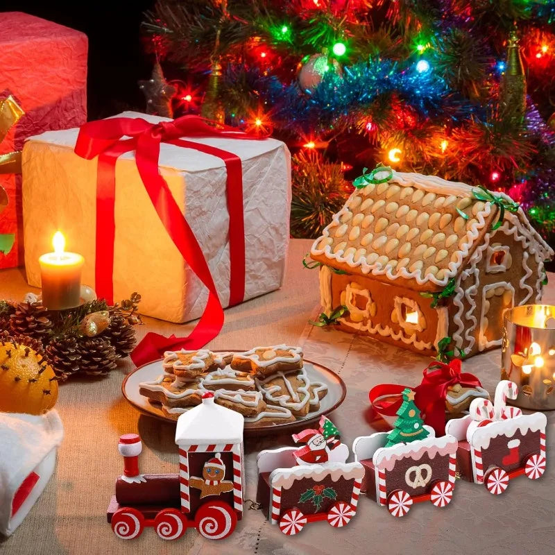Painted wooden Christmas train set with red-and-white stripe cars and gingerbread house car
