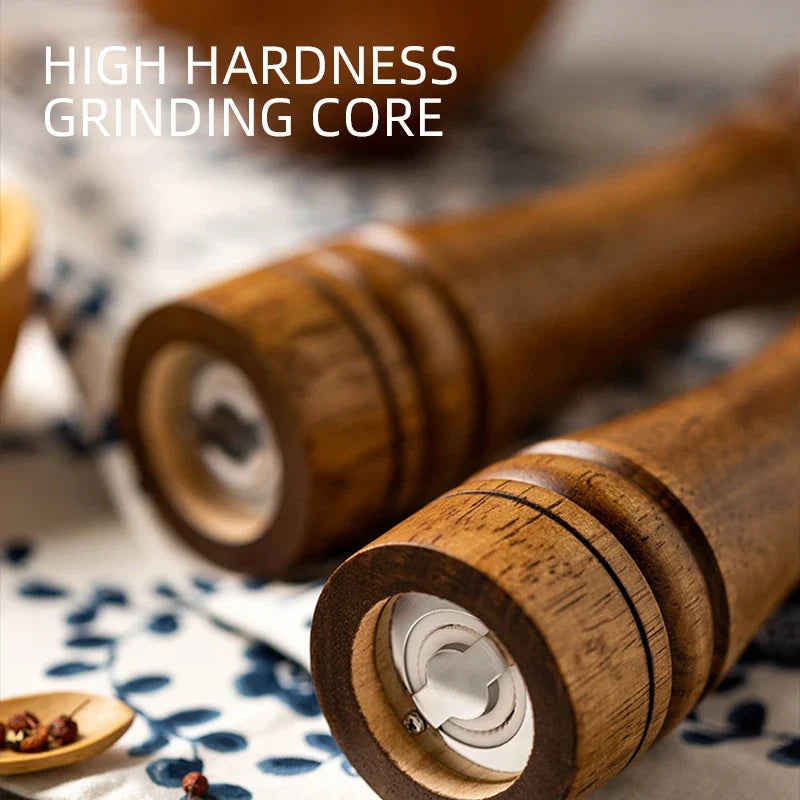 Close-up view of ceramic grinding core inside an oak wood pepper mill