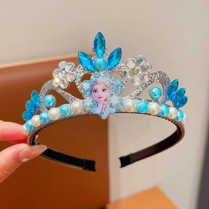 Blue crystal crown headband with faux pearls and central princess figure