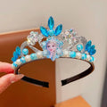 Blue crystal crown headband with faux pearls and central princess figure