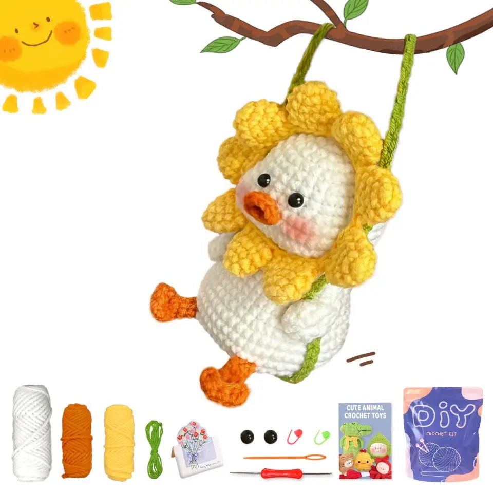 Crochet animal toy kit with yellow-and-cream plush creature, hook, and yarn supplies