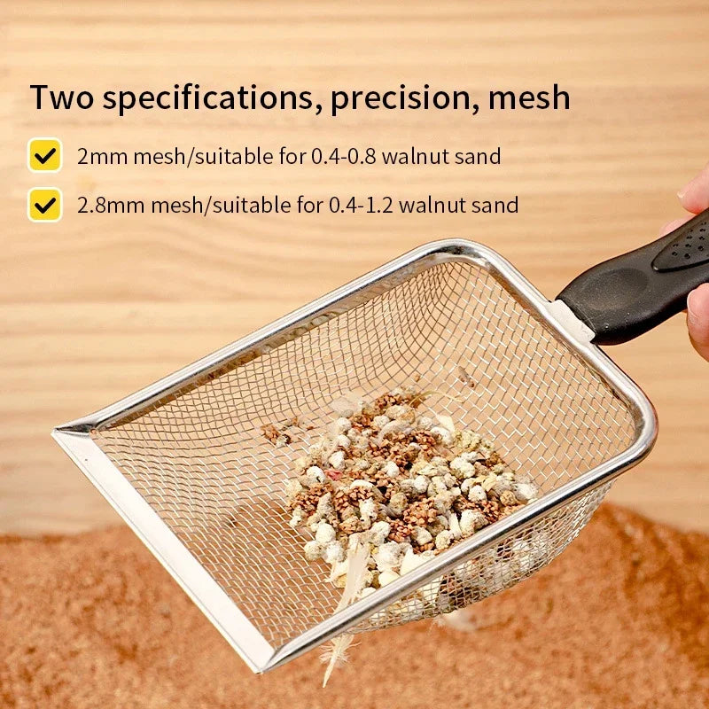 Stainless steel fine mesh sifting scoop with black handle, holding sifted material