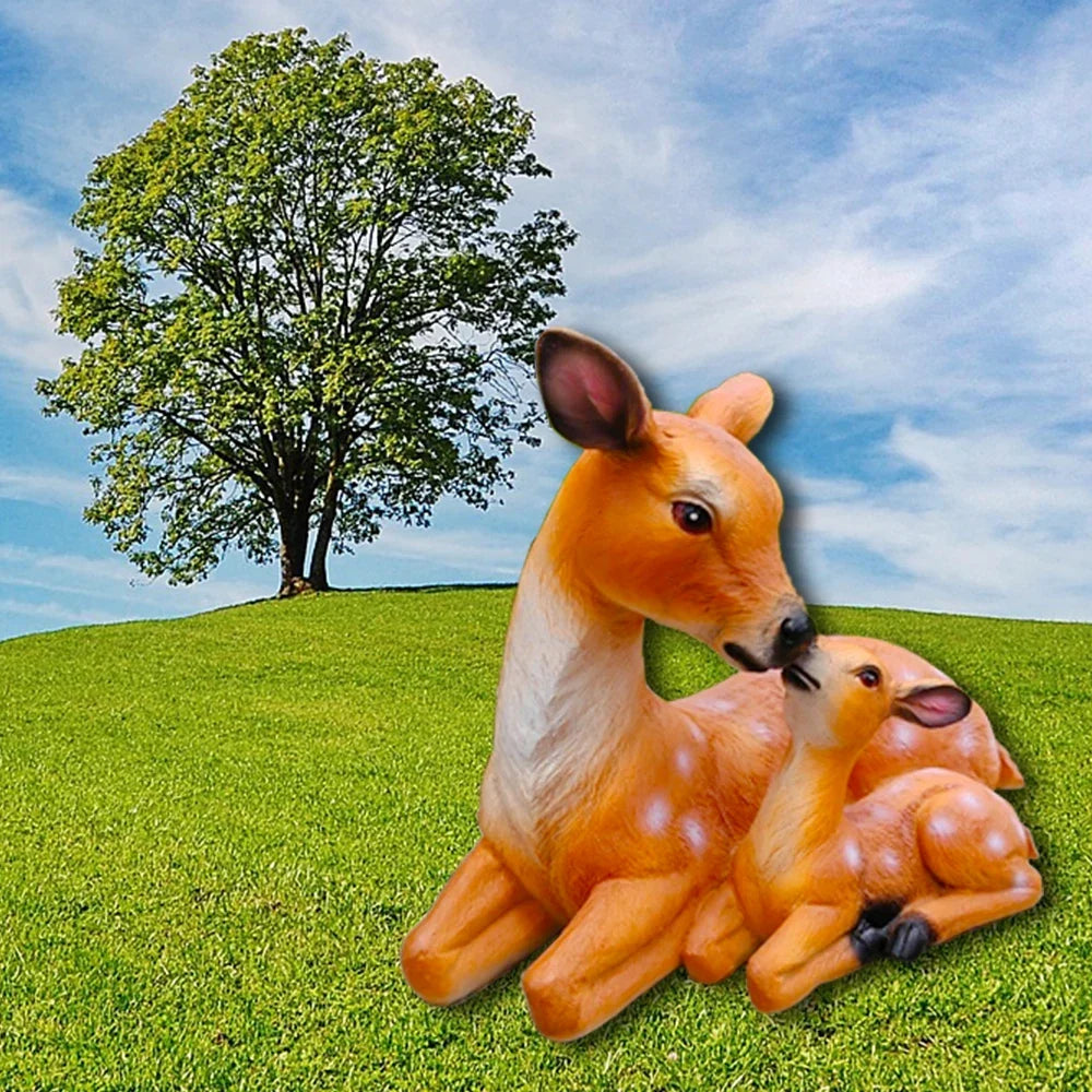 Doe and fawn deer statue set, mother deer cuddling a fawn