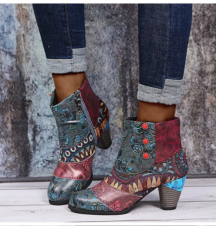 Women’s ankle boots with teal and burgundy folk print, side zipper, and mid block heel.