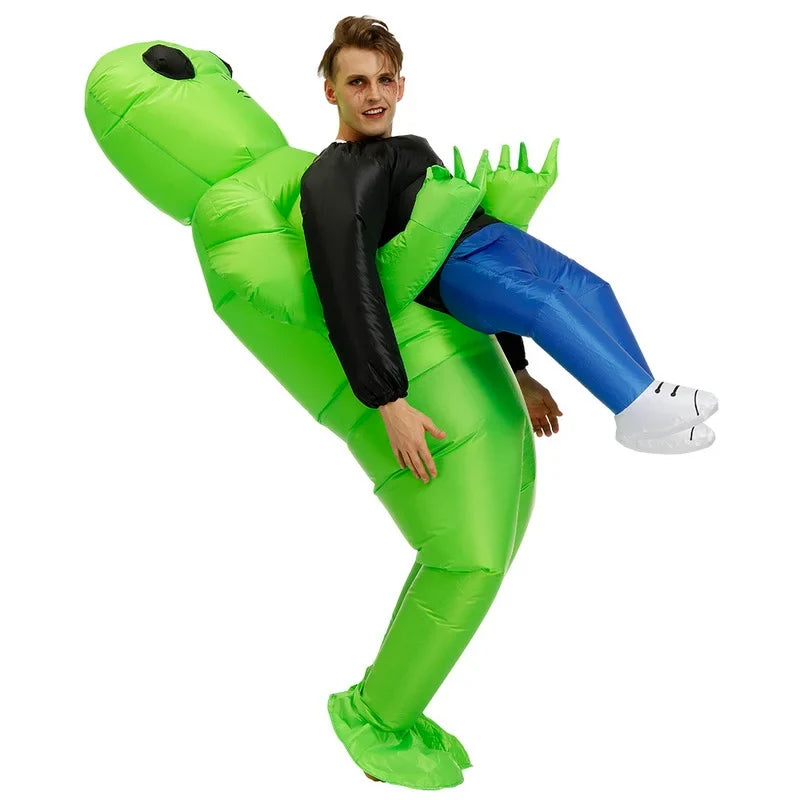 Inflatable green alien costume with black hood, spiked shoulder, blue pants, white shoe covers.
