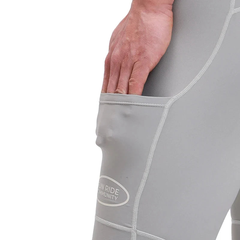 Men's padded cycling shorts in light gray with side logo patch