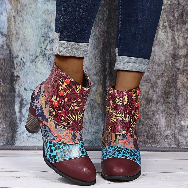 Women’s ankle boots in multicolor folk print with side zipper and low block heel.