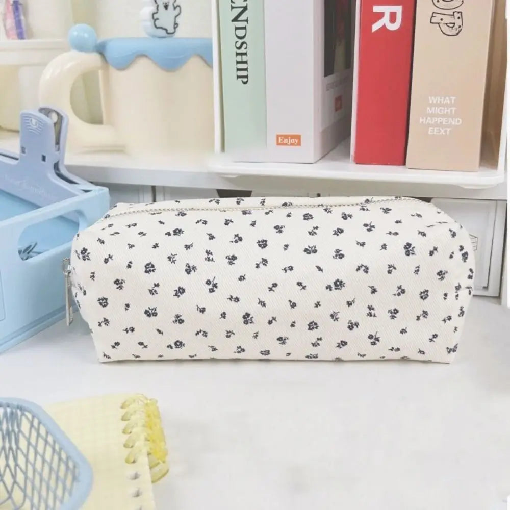 Large canvas pencil pouch with zipper, cream fabric with small black floral scatter
