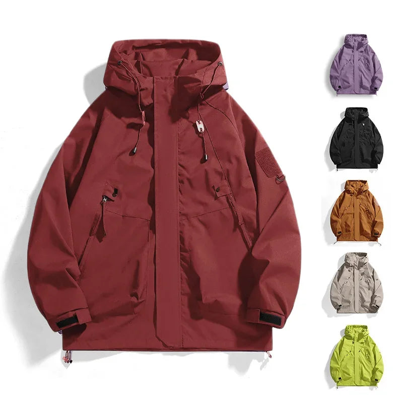 Unisex waterproof windbreaker jacket in maroon with adjustable hood and zip front.