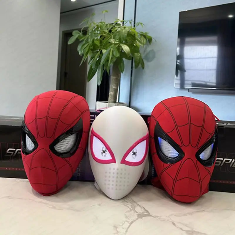 Red Spider-Man electronic mask with glowing mesh eyes shown with other masks