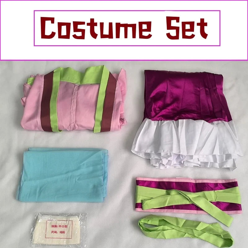 Anime cosplay costume set laid out: pink top, purple skirt, white ruffle trim, green accents